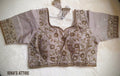 Flat lay and close-up view of a taupe/grey soft silk blouse with intricate copper beadwork, sequin floral motifs, sweetheart neckline, padded construction, and back latkans.Tubelight bugle beads lining the neckline, waist, and cuffs.  Intertwining vine and bloom patterns filled with shimmering sequins and pearl seeds. 