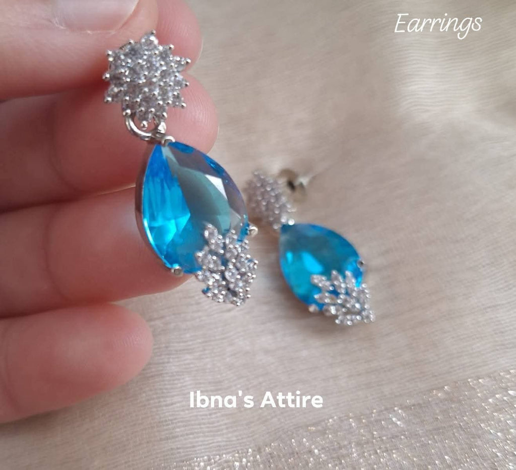 Rhodium Polish Aqua Blue Monalisa Stone & American Diamond 4-Piece Jewelry Set | Delicate Crystal Pendant Necklace, Bracelet, Earrings & Adjustable Ring