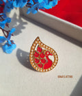 

Featuring a Gold-Plated Enamel Peacock Design Statement Ring. Rich red enamel detailing capturing the iconic form and feathered tail of a majestic peacock.