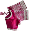 A magenta pink and beige embroidered zimmy choo silk blouse set laid flat on a white background