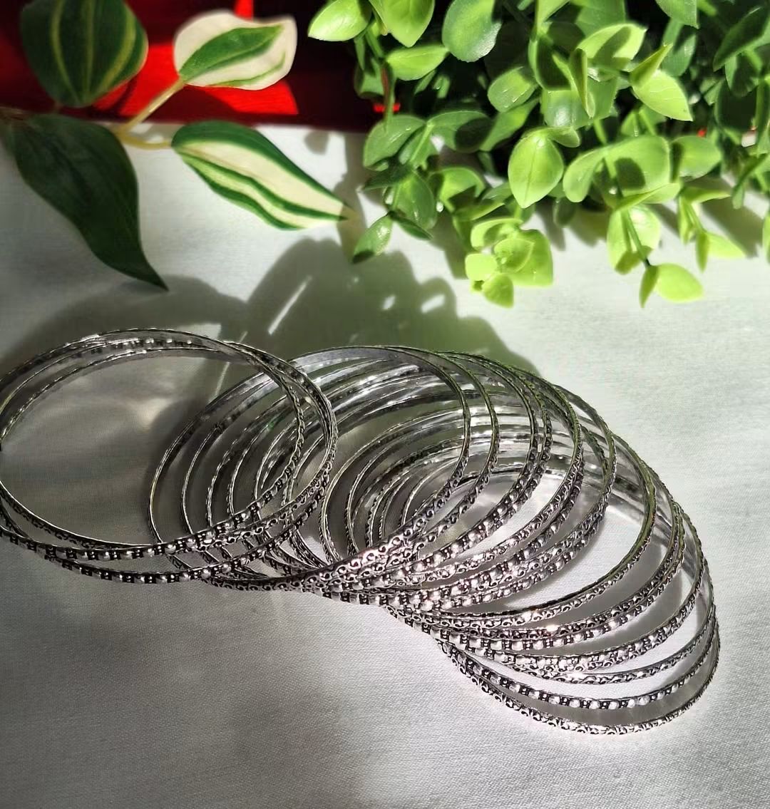 German Silver Bangles Set with Intricate Engraved Patterns (20 piece set) (Size-2.8)