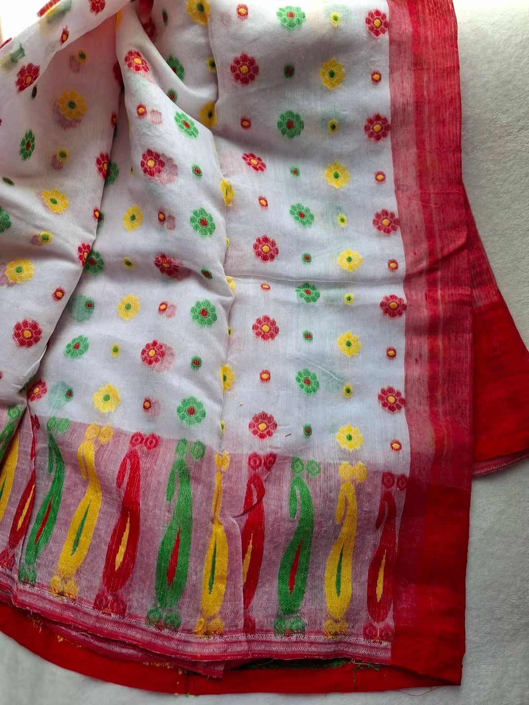Exclusive Powerloom Dhakai Jamdani Saree in White with Multi-Color Woven Motifs and Red Pallu (Without Blouse Piece)