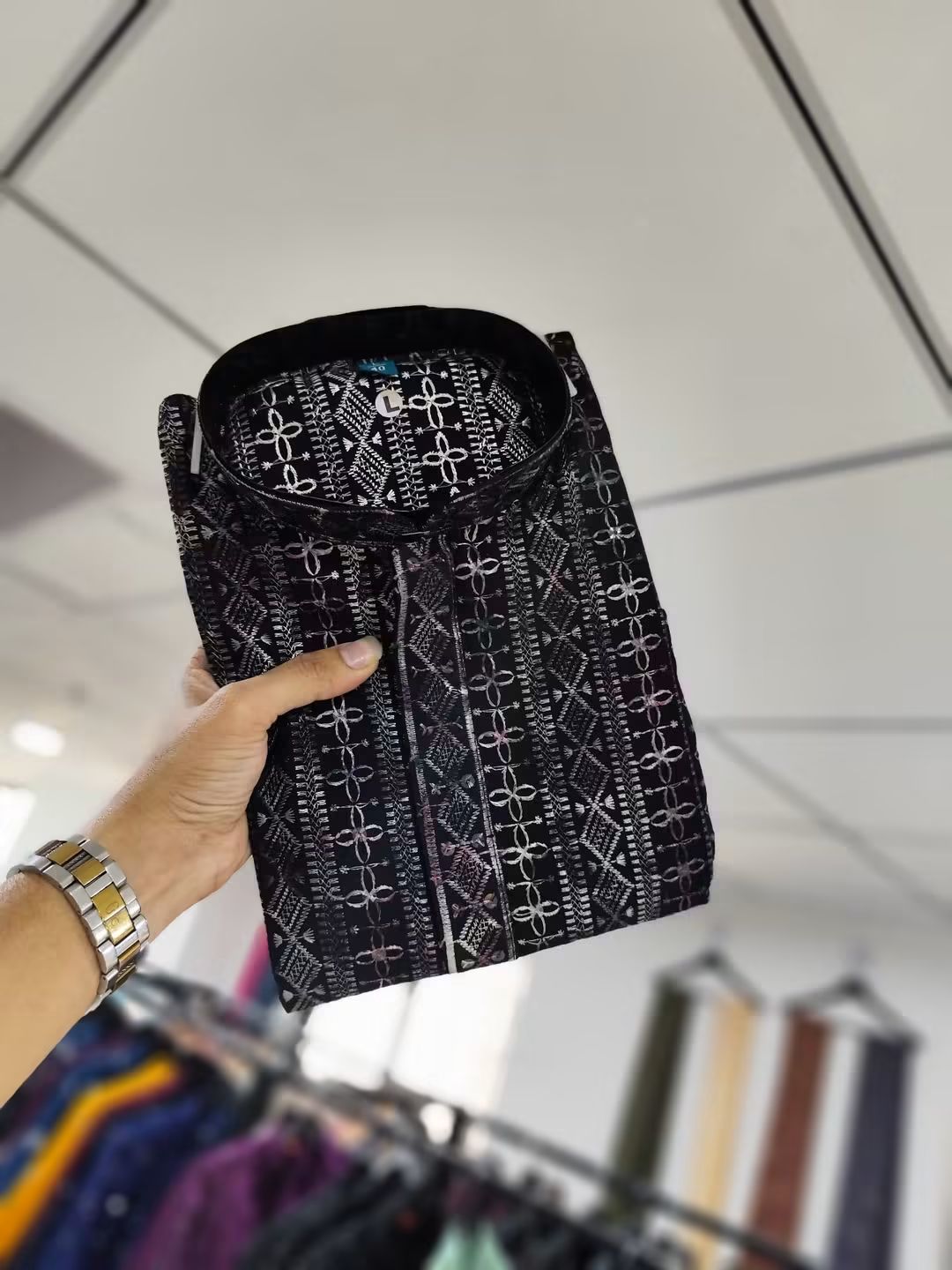 Featuring a floded Classic Lucknowi Embroidered Kurta / Panjabi, in black and silver. Soft, skin-friendly, and lightweight pure viscose rayon that ensures effortless movement and all-day comfort.Regal, Graceful, and Traditional