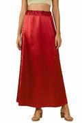 Featuring a woman wearing on a red color ultra-satin silk peticoat / Shapewear/ inskirt on a white background 