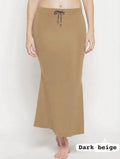 A woman modeling a long, dark beige slip-style maxi skirt with a drawstring waistband, shown against a plain light background with a text label 'Dark beige' in the bottom right corner.
