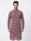 A man modeling a long-sleeved rayon kurta with a maroon and white geometric pattern, standing against a plain light gray background.