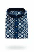Folded blue silk kurta, white geometric embroidery with sequence details, button placket, held by a hand wearing a watch.