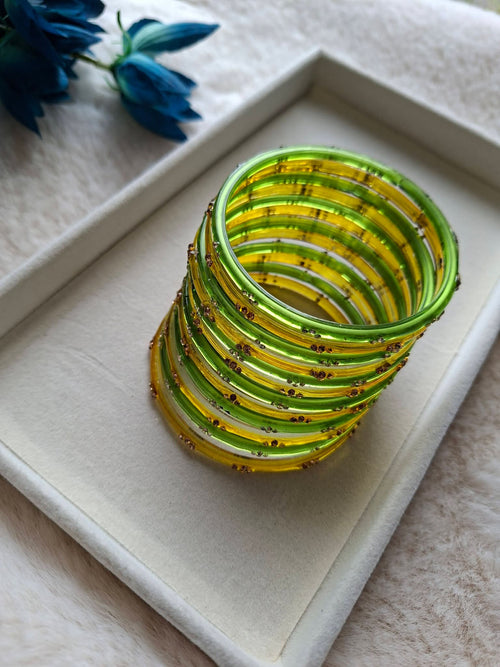 12-Piece Dual-Tone Glass Bangle Stack with Gold Sequin Accents | Olive Green & Golden Amber Festive Glass Churi Set (Size 2.8)