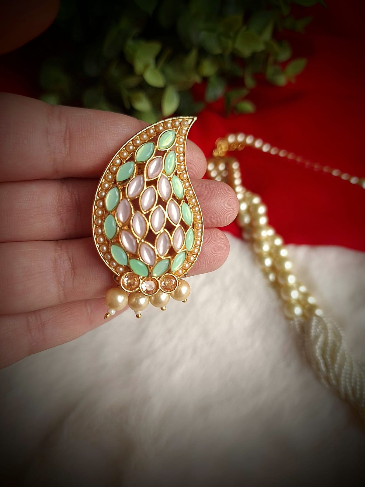 Exquisite Reverse AD Stone Necklace Set with Pearl Strands and Matching Paisley Earrings in Mint Green and Soft Pink