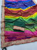 Colorful traditional lehraiya saree with a patterned border on a light gray background