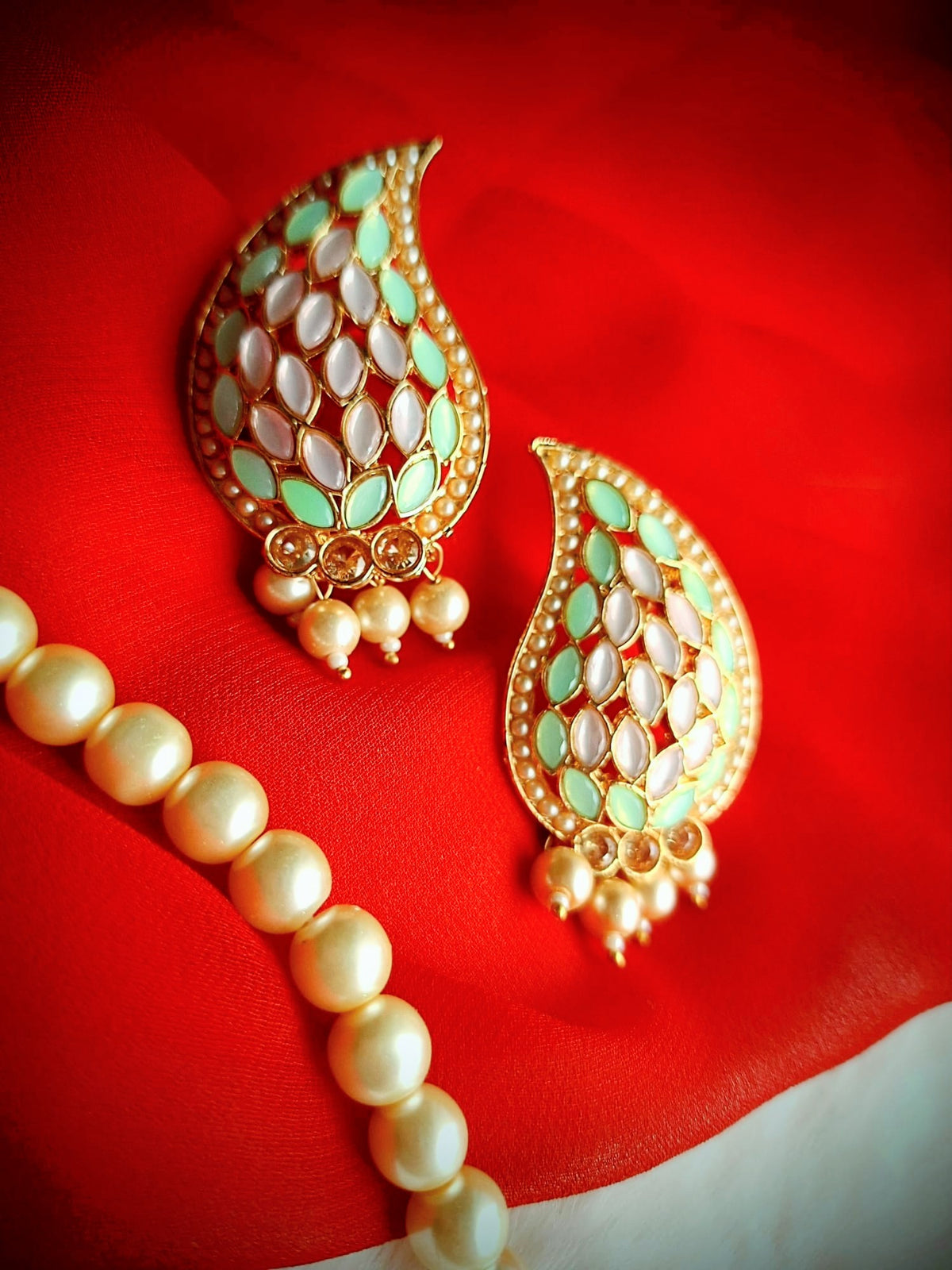 Exquisite Reverse AD Stone Necklace Set with Pearl Strands and Matching Paisley Earrings in Mint Green and Soft Pink