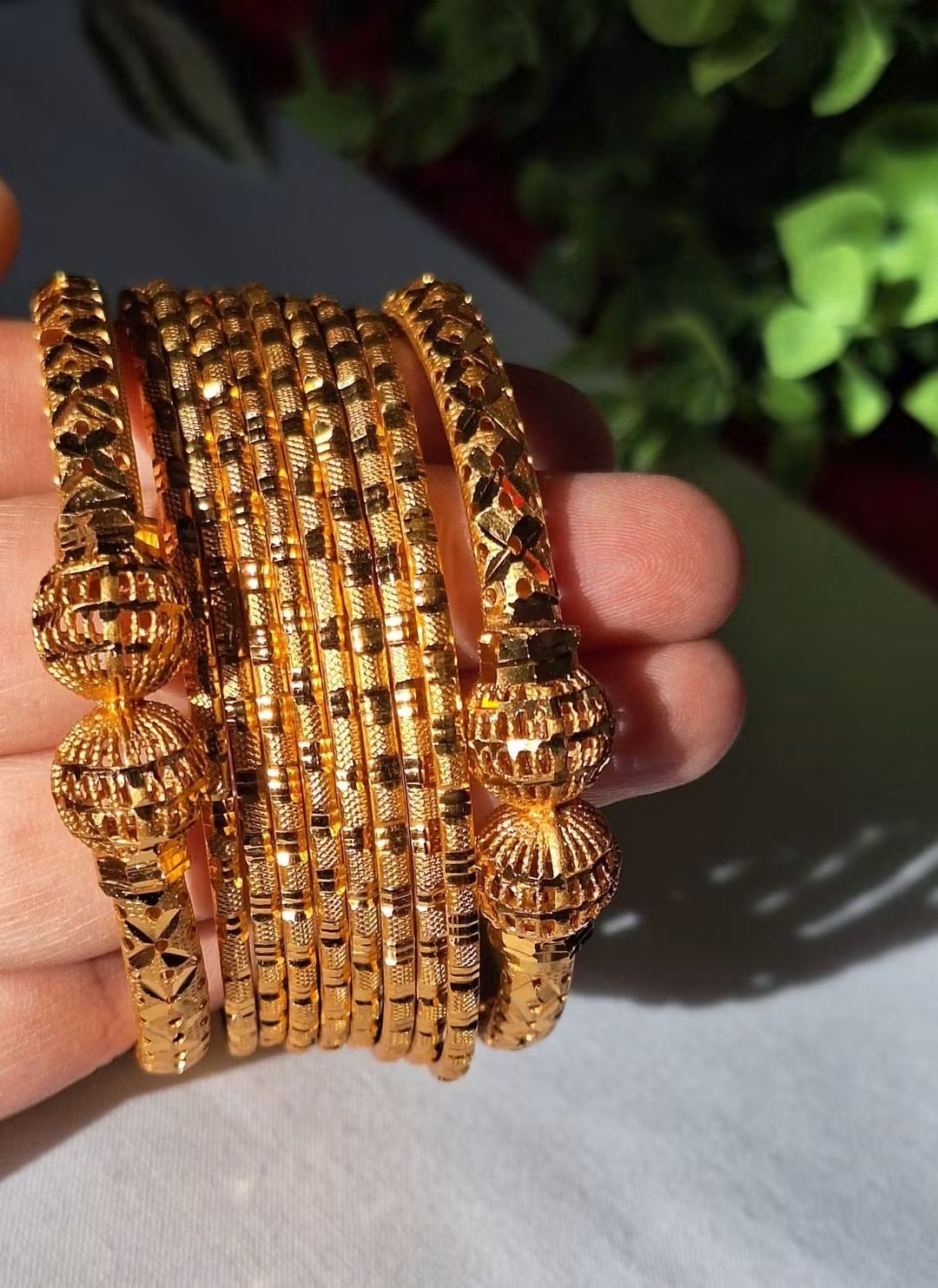 Premium Gold Plated Traditional Indian Bangles Set. High-shine golden plating that delivers an authentic, high-end traditional look.